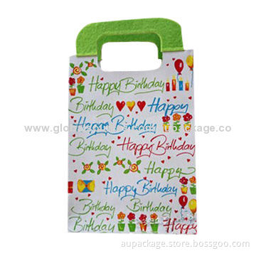 Paper handle bag with beautiful feather accessories